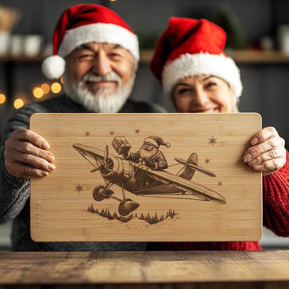 Gravure au laser sur planches charcuterie en forme d’avion du père Noël | Décoration de cuisine